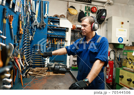 Marine engineer officer in engine control room ECR Marine engineer officer in engine control room ECR 70544506