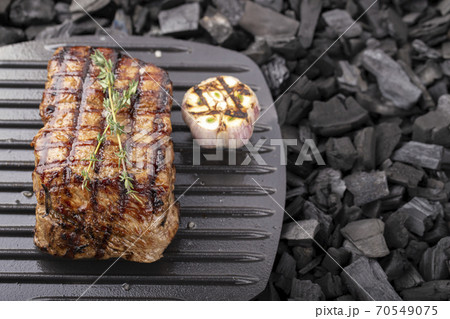 Grilled beef steaks with spices grilled. Grilled beef steaks with spices grilled. 70549075
