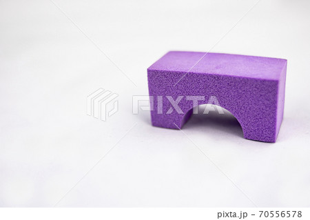 Violet toy sponge jumper on white background Violet toy sponge jumper on white background 70556578