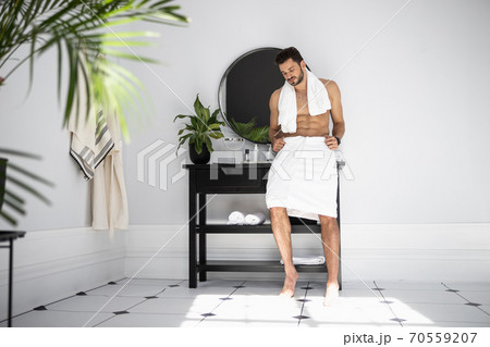 Portrait of bearded man with towel on his neck 70559207
