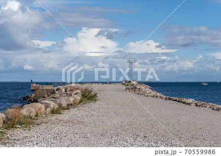 The Island artificial island, Malmo, Sweden. Land meets blue water and sky The Island artificial island, Malmo, Sweden. Land meets blue water and sky 70559986