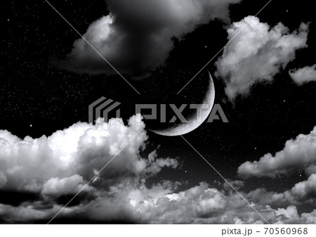 The moon in the night sky 70560968