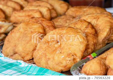 Mouth-watering fried pies with delicious filling Mouth-watering fried pies with delicious filling 70563220