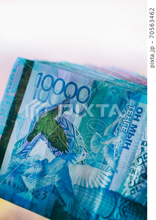 A pack of tenge money on a white background 70563462