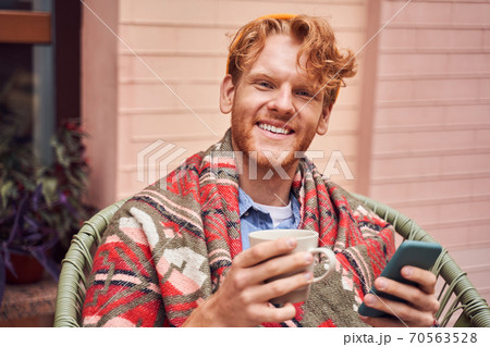 Close up man drinking coffee in cafe Close up man drinking coffee in cafe 70563528