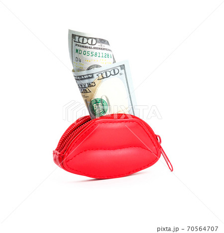 Love for money. Red leather purse in form of lips and banknotes of one hundred dollars. Women's salary. Selling love. Love for money. Red leather purse in form of lips and banknotes of one hundred dollars. Women's salary. Selling love. 70564707