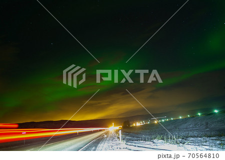 Northern lights in the night sky of iceland. Soft focus. Magical green glow. 70564810