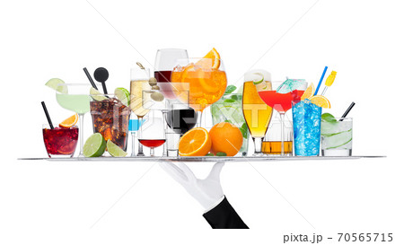 Batler waiter wearing white glove tray with various cocktails with ice isolated on white. Batler waiter wearing white glove tray with various cocktails with ice isolated on white. 70565715