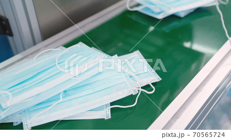 Face mask production line in modern factory 70565724