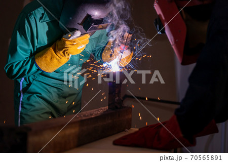 Metal welding steel works using electric arc welding machine Metal welding steel works using electric arc welding machine 70565891