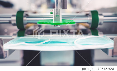 Face mask production line in modern factory Face mask production line in modern factory 70565928