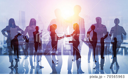 Abstract image of many business people together in group on background of city Abstract image of many business people together in group on background of city 70565963