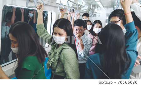 Sick man on train cough and make other people feel worry about virus spreading Sick man on train cough and make other people feel worry about virus spreading 70566030