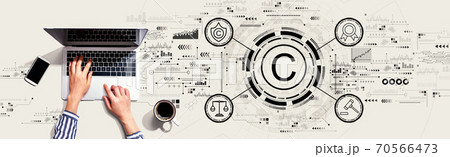 Copyright concept with person using laptop 70566473