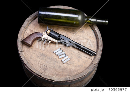 Old West Weapon - Percussion Army Revolver with paper cartidges and green glass liquor bottle 70566977