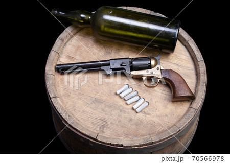 Old West Weapon - Percussion Army Revolver with paper cartidges and green glass liquor bottle 70566978