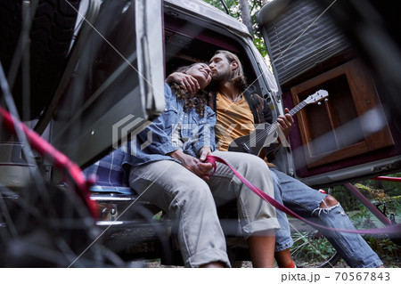 Couple camping outdoors 70567843