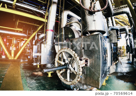 Industry plant concept,Equipment, cables and piping as found inside of a modern industrial power plant or offshore platform 70569614