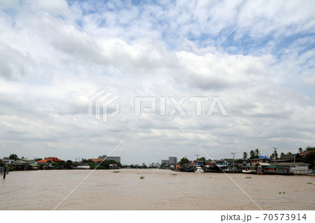 Beautiful view of Chaophraya River, many white cloud on the blue sky. 70573914