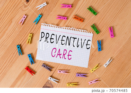 Conceptual hand writing showing Preventive Care 70574485
