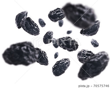 Dried prunes levitate on a white background 70575746