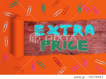 Writing note showing Extra Price. Business photo 70576463