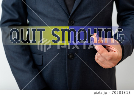 Writing note showing Quit Smoking. Business photo 70581313