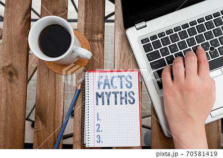 Conceptual hand writing showing Facts Myths 70581419