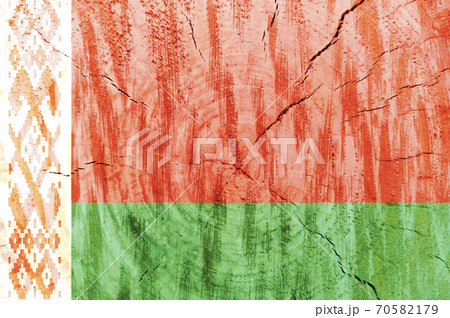 Belarus flag printed on wooden surface. Belorussian symbol on cracked surface 70582179