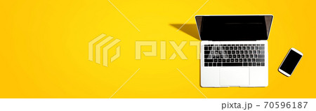 Laptop computer with a smartphone 70596187