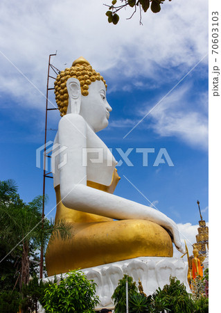 Big Buddha statue in the Wat Phra That Doi Kham temple. 70603103