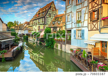 Amazing medieval half-timbered facades reflecting in water, Colmar, France 70603387