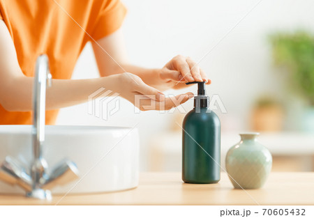 Person is washing hands Person is washing hands 70605432