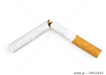 Quit smoking concept. Close up of a smoking cigarettes on white. 70612654