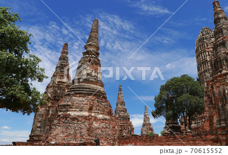 Pagodas on blue sky background in the Chaiwatthanaram (Prosperity of victory) Temple Pagodas on blue sky background in the Chaiwatthanaram (Prosperity of victory) Temple 70615552