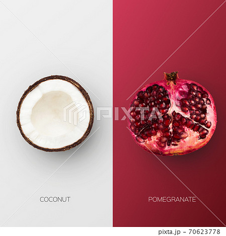 Pomegranate And Coconut Halves Over Maroon Red And White Background Pomegranate And Coconut Halves Over Maroon Red And White Background 70623778