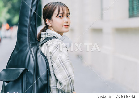 Woman, guitar, streetstyle Woman, guitar, streetstyle 70626742