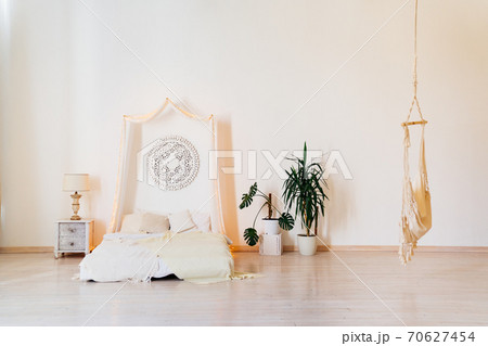 four-poster bed and bright interior.  70627454