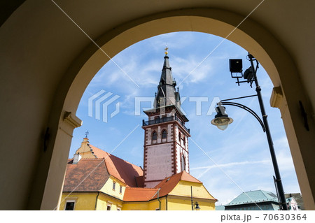 Sightseeing tower of the late gothic decanal Church of the Assumption of the Virgin Mary in Chomutov, Usti nad Labem region, Krusne hory, Ore Mountains, Czech Republic, sunny summer day, clear blue 70630364