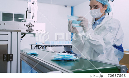 Face mask production line in modern factory Face mask production line in modern factory 70637868