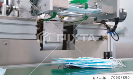 Face mask production line in modern factory 70637890