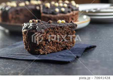 Piece of chocolate cake 70641428