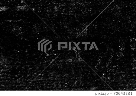 The rough textured surface of the wall is black . Texture or background. The rough textured surface of the wall is black . Texture or background. 70643231