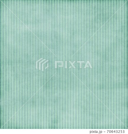 A sheet of green paper with vertical stripes.Texture or background 70643253