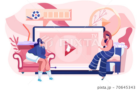 Female characters looking video blog, sitting on chairs, opened laptop with video player button 70645343