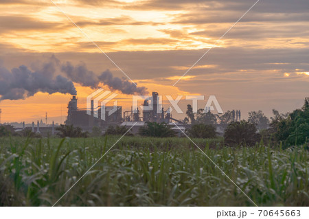 Mae Moh Coal Power Plant with smoke and toxic air from chimney. Factory industry. Electricity tower in energy or pollution environment concept. Lampang City, Thailand Mae Moh Coal Power Plant with smoke and toxic air from chimney. Factory industry. Electricity tower in energy or pollution environment concept. Lampang City, Thailand 70645663