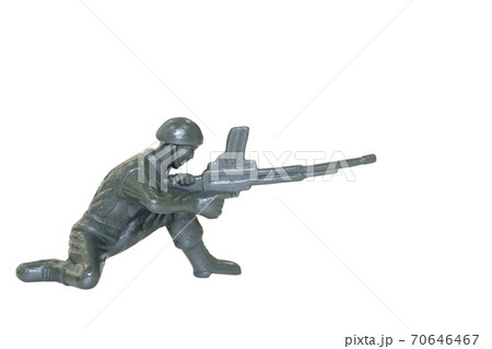 Miniature toy soldier on white background 70646467