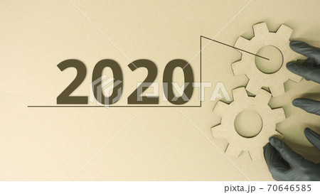 2020 text and recycled cardboard cogwheels 2020 text and recycled cardboard cogwheels 70646585