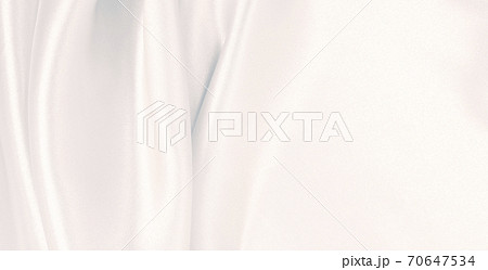 Smooth elegant grey silk or satin luxury cloth as wedding background. Luxurious background design Smooth elegant grey silk or satin luxury cloth as wedding background. Luxurious background design 70647534