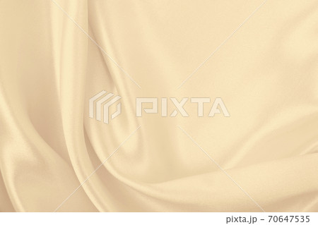 Smooth elegant golden silk or satin luxury cloth texture as wedding background. Luxurious background design. In Sepia toned. Retro style 70647535